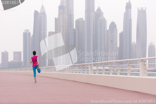 Image of woman stretching and warming up