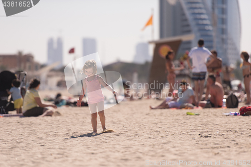 Image of little cute girl at beach