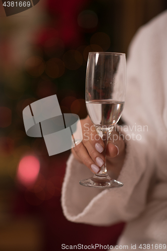 Image of woman drinking champagne at spa