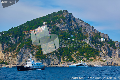 Image of Capri town on Capri island, Campania, Italy. Capri is an island in the Tyrrhenian Sea off the Sorrentine Peninsula, on the south side of the Gulf of Naples in the Campania region of Italy.