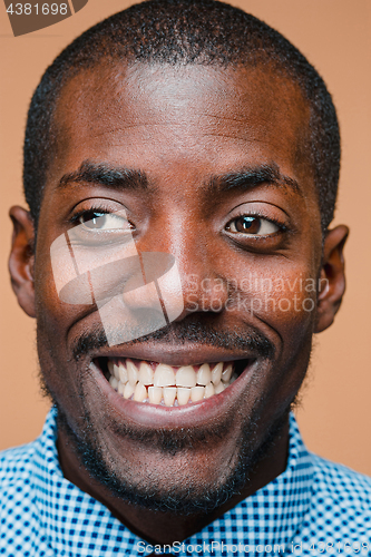Image of Portrait of a very happy afro American man