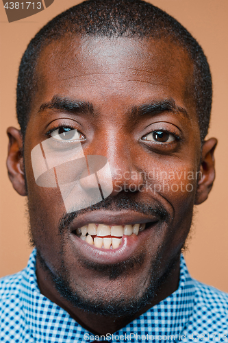 Image of Portrait of a very happy afro American man