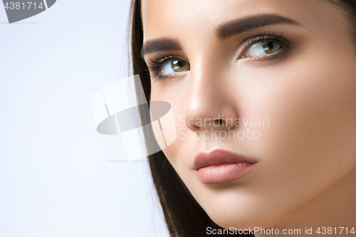 Image of The beautiful face of young woman with cleanf fresh skin