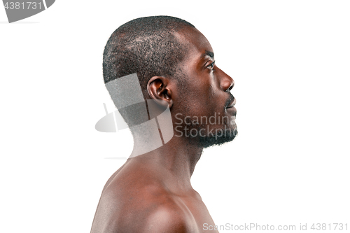 Image of Positive thinking African-American man on brown background