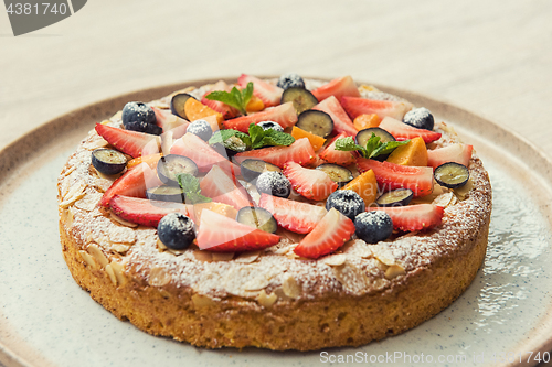Image of cakes with fruit and berries
