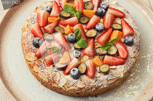 Image of cakes with fruit and berries