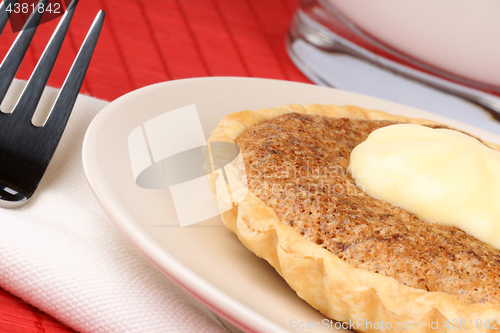 Image of Mini walnut tart close-up