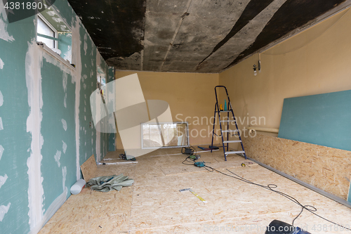 Image of Repair in a private house, one wall is finished with plasterboard sheets