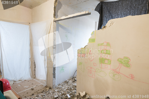 Image of Dismantling the partitions in the apartment, the doorways are covered with a cloth