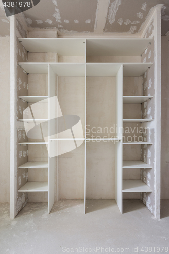 Image of Installation of a built-in wall cabinet