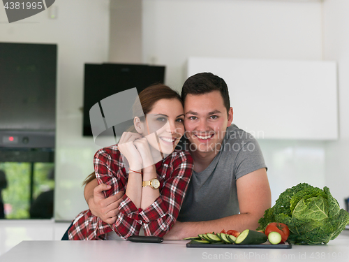 Image of Young couple in the kitchen