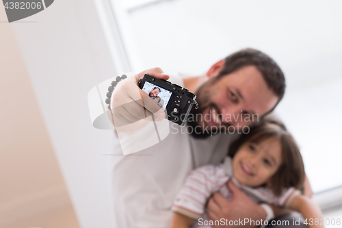 Image of selfie father and son
