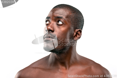 Image of Positive thinking African-American man on brown background