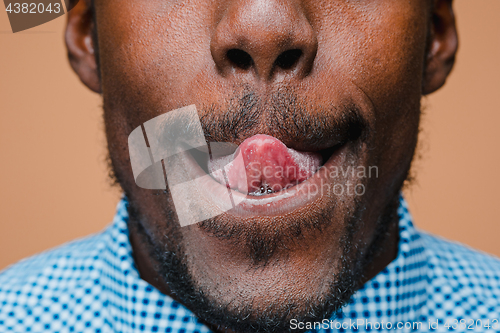 Image of Portrait of a very happy afro American man