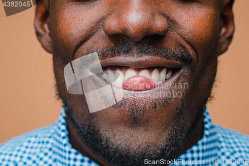 Image of Portrait of a very happy afro American man
