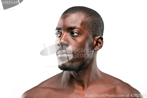 Image of Positive thinking African-American man on brown background