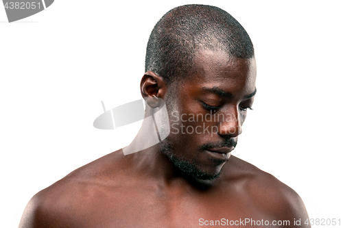 Image of Positive thinking African-American man on brown background