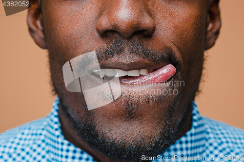 Image of Portrait of a very happy afro American man