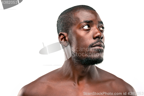 Image of Positive thinking African-American man on brown background