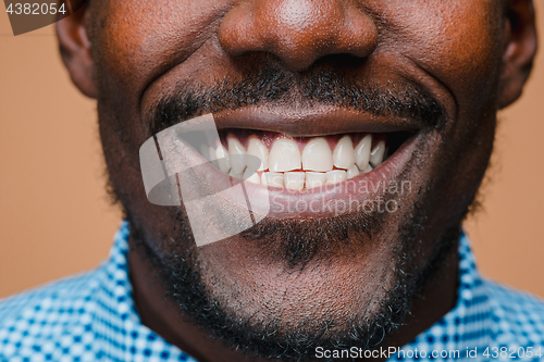 Image of Portrait of a very happy afro American man