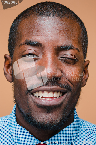 Image of Portrait of a very happy afro American man