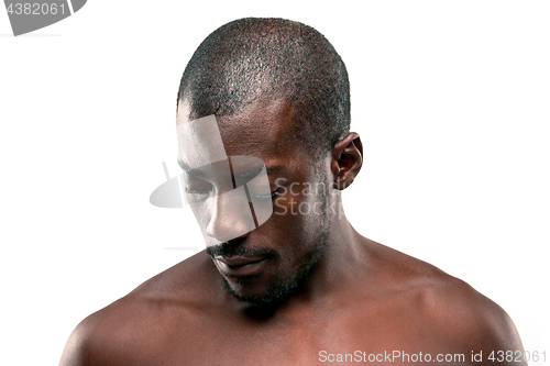 Image of Positive thinking African-American man on brown background