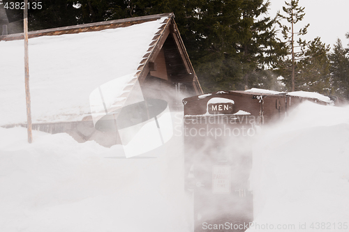 Image of Mens Room Winter Snow Storm Crater Lake Oregon