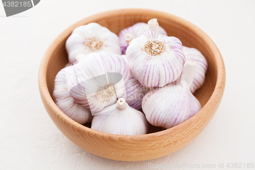 Image of garlic bulbs on white background