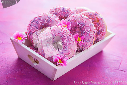 Image of delicious pink donuts