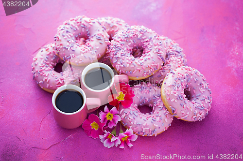 Image of delicious pink donuts