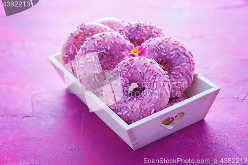 Image of delicious pink donuts