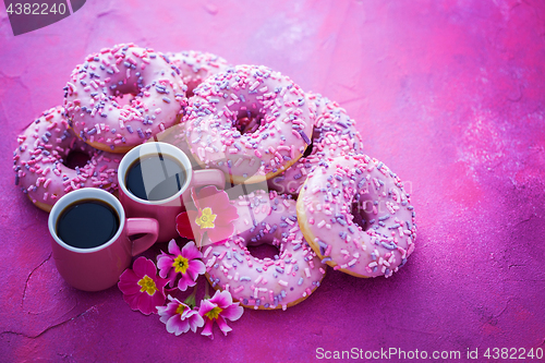 Image of delicious pink donuts