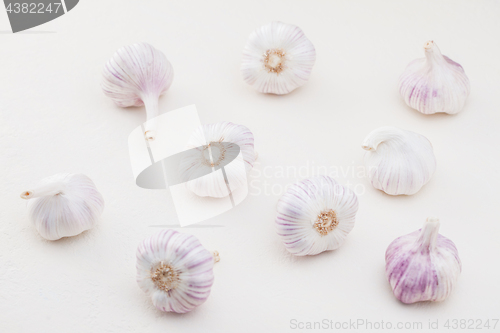 Image of garlic bulbs on white background