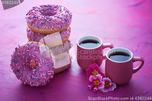 Image of delicious pink donuts