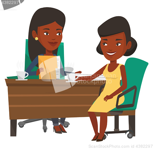 Image of Two business women during meeting.