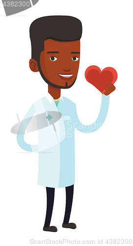 Image of Doctor cardiologist holding heart.
