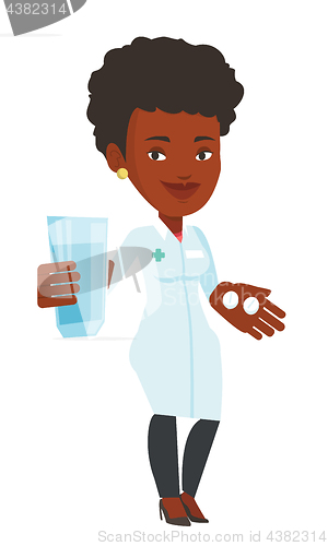 Image of Pharmacist giving pills and glass of water.