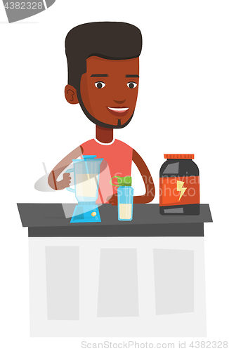 Image of Young man making protein cocktail.