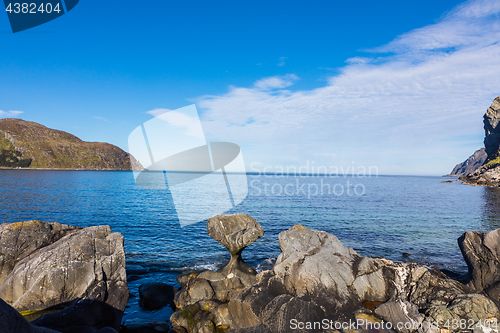 Image of Kannesteinen is a special shaped stone located on the shore of O