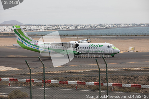 Image of ARECIFE, SPAIN - APRIL, 15 2017: ATR 72 of Binter ready to take 