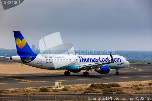 Image of ARECIFE, SPAIN - APRIL, 16 2017: AirBus A321 of ThomasCook.com w