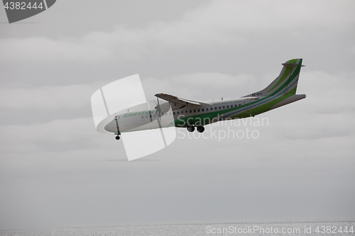 Image of ARECIFE, SPAIN - APRIL, 15 2017: ATR 72 of Binter landing at Lan