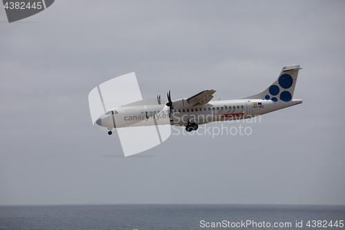 Image of ARECIFE, SPAIN - APRIL, 15 2017: ATR 72 of CANARYFLY.es landing 