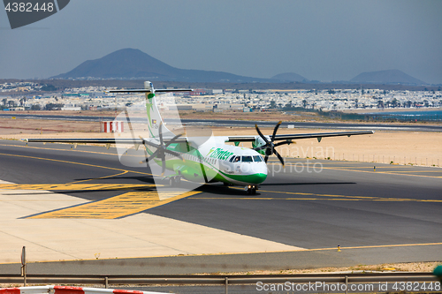 Image of ARECIFE, SPAIN - APRIL, 16 2017: ATR 72 of Binter with the regis