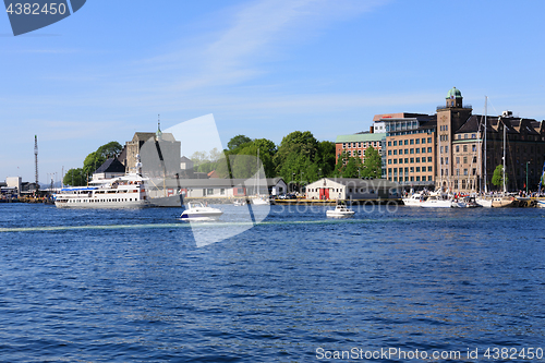 Image of BERGEN HARBOR, NORWAY - MAY 27, 2017: Private boats on a row alo