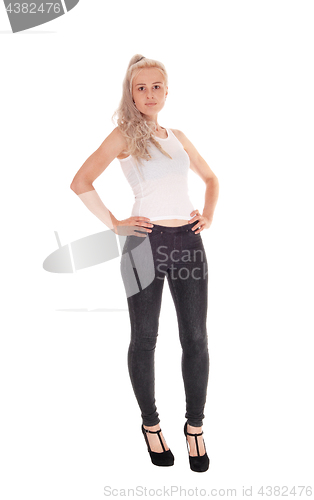 Image of Blond woman in t-shirt and black jeans