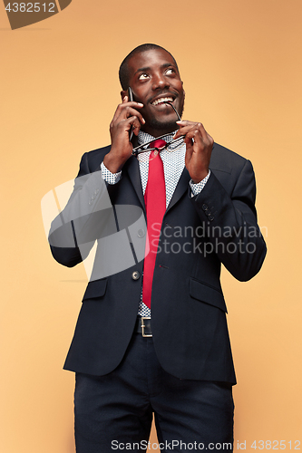 Image of Young african business man on the phone