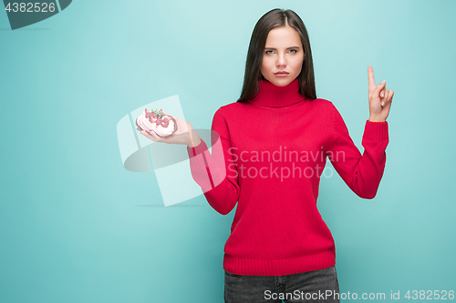 Image of Beautiful women holding small cake. Birthday, holiday.