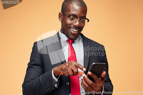 Image of Young african business man on the phone