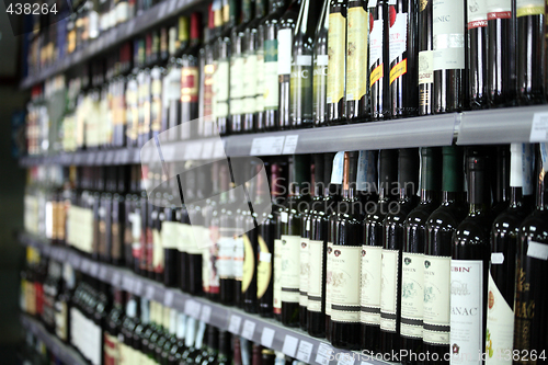 Image of Wine bottles in a row, selective focus